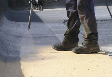 Coating systems over Miami spray foam roof systems