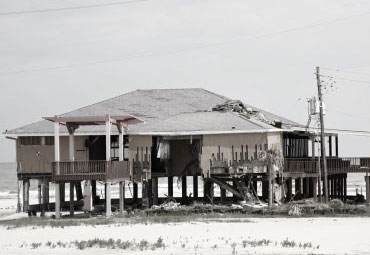 Wind damage - spray foam can help prevent uplift to Miami roofs